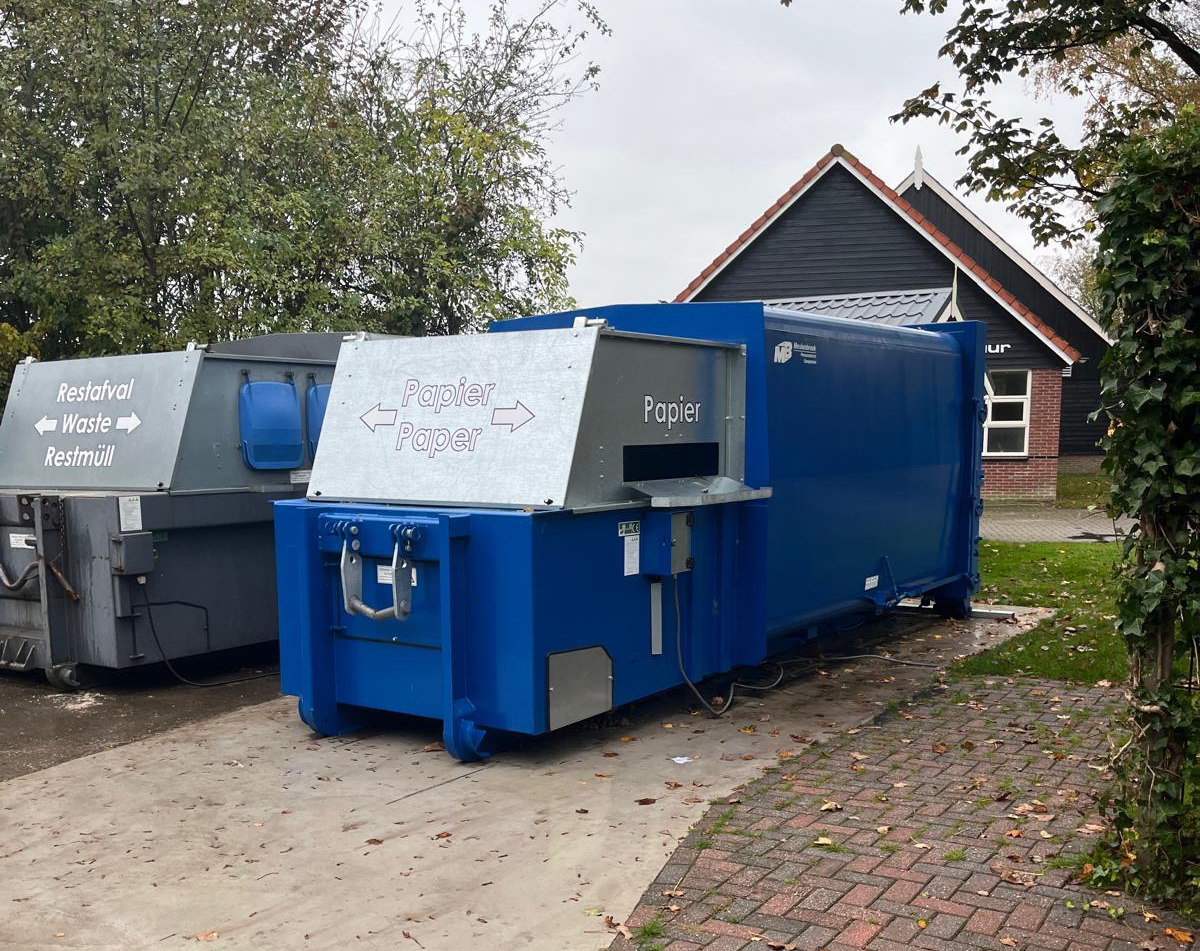 Een perscontainer, geschikt voor grote hoeveelheden en weinig ruimte.